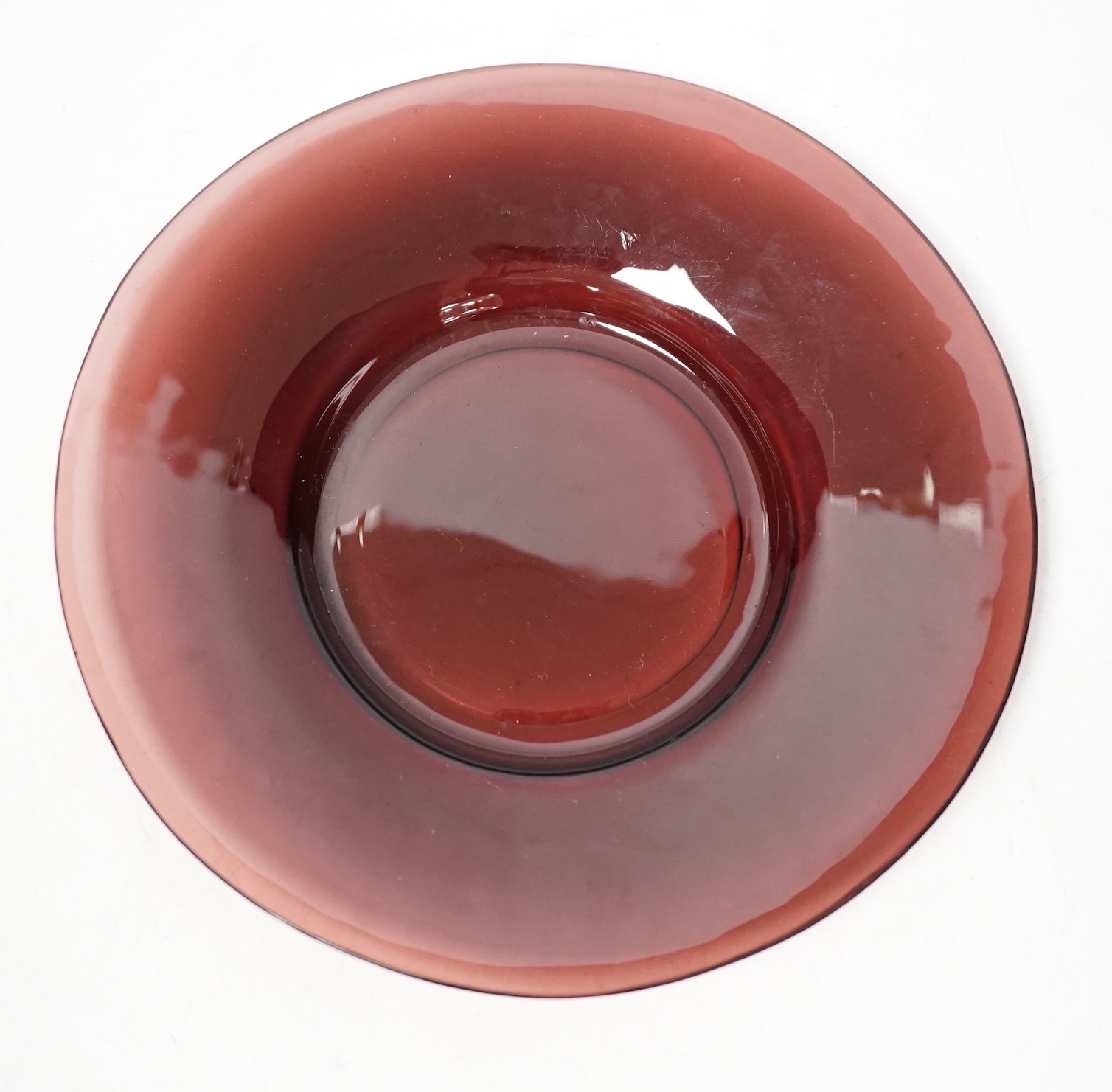 Six 19th century Chinese amethyst glass plates, 19cm diameter